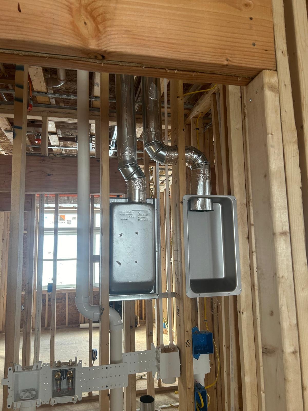 Equipment closet installation by Mariano HVAC in Massachusetts