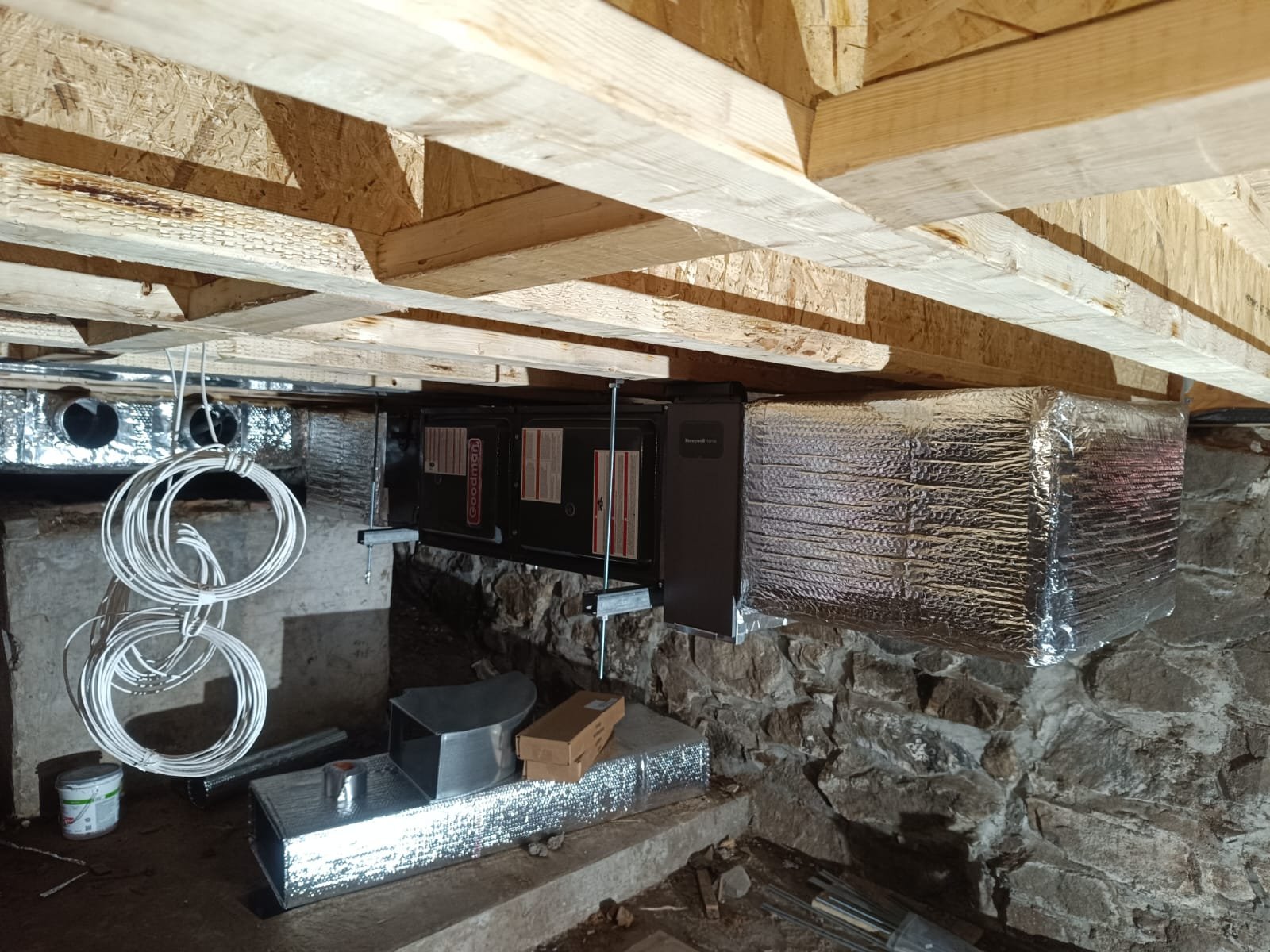 Basement ductwork and equipment by Mariano HVAC in Massachusetts