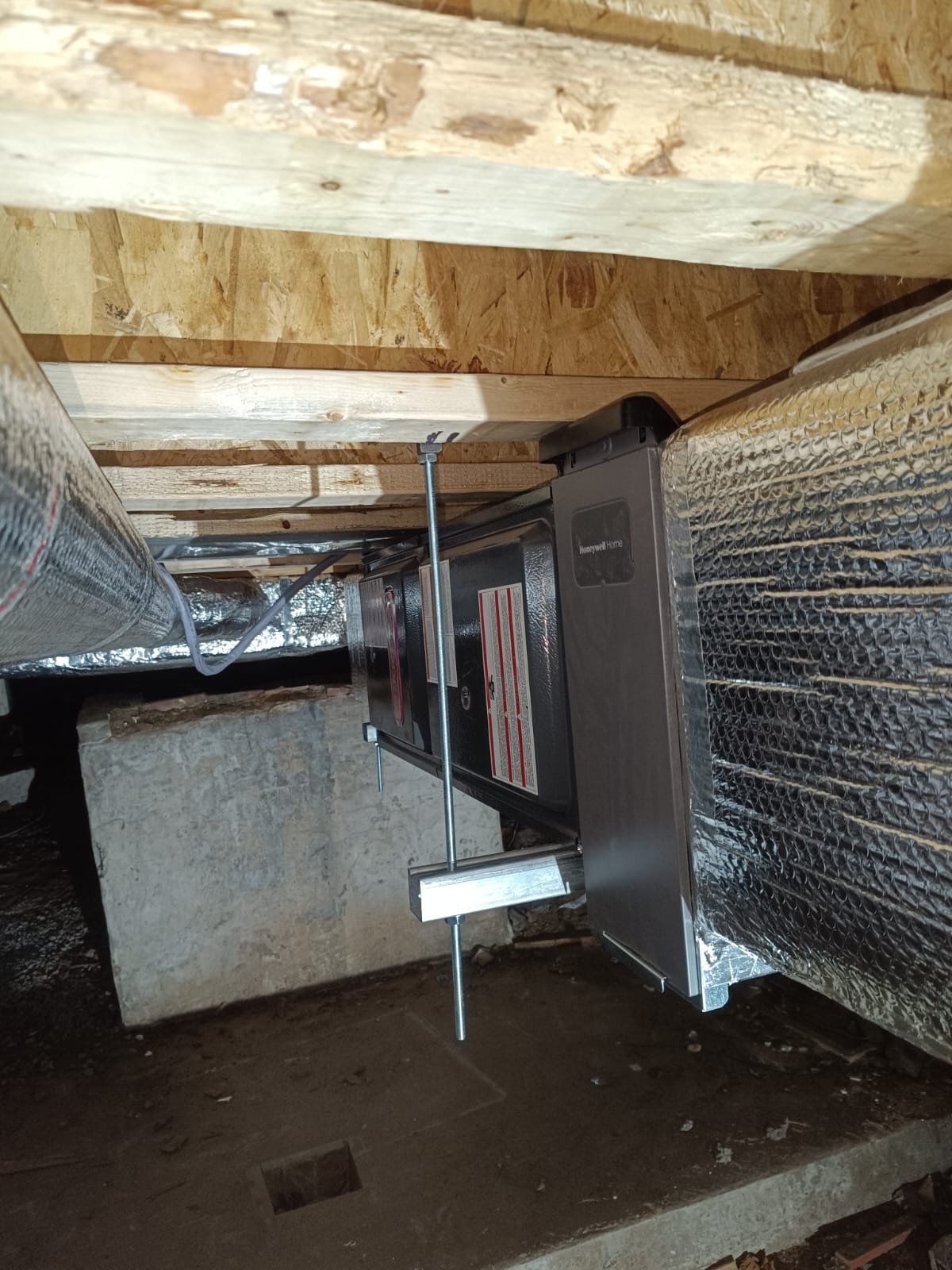 Insulated ductwork in a commercial space by Mariano HVAC in Massachusetts