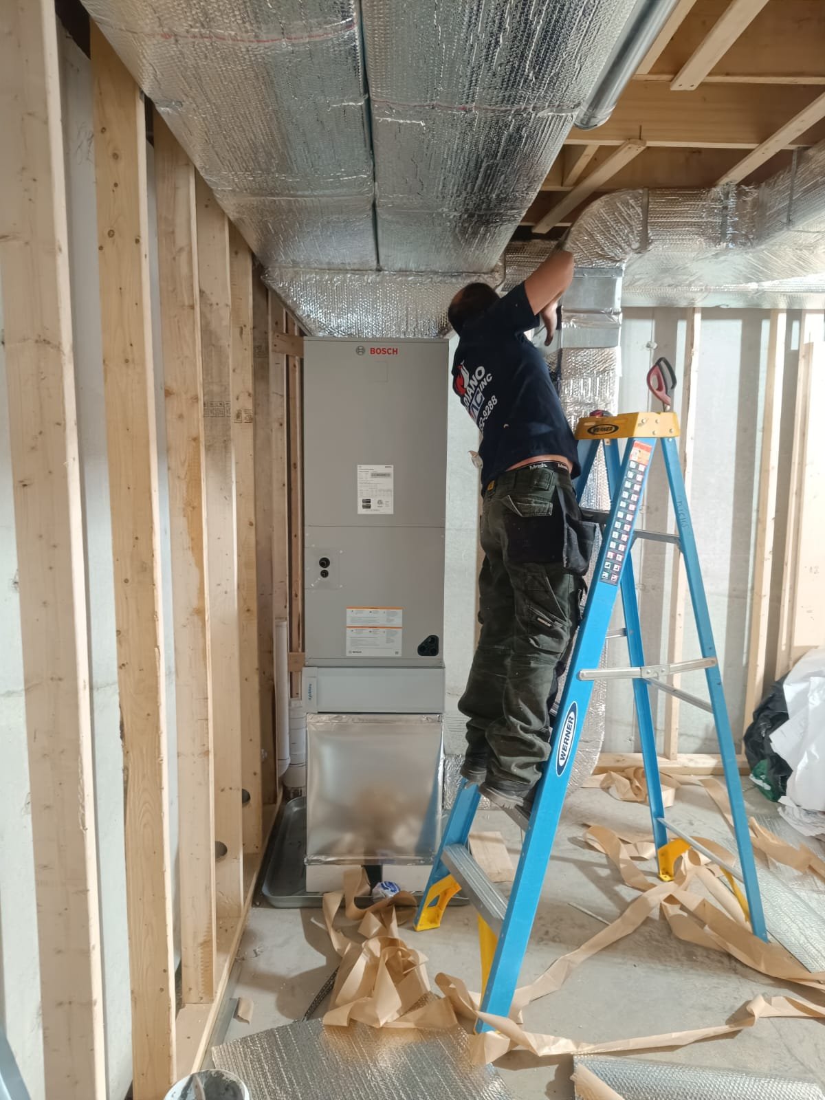 Mariano HVAC technician installing an air handler